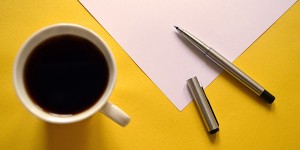 Coffee, paper, pens, ingredients for good design