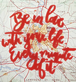 Handlettering over a map - Be in love with your life every minute of it