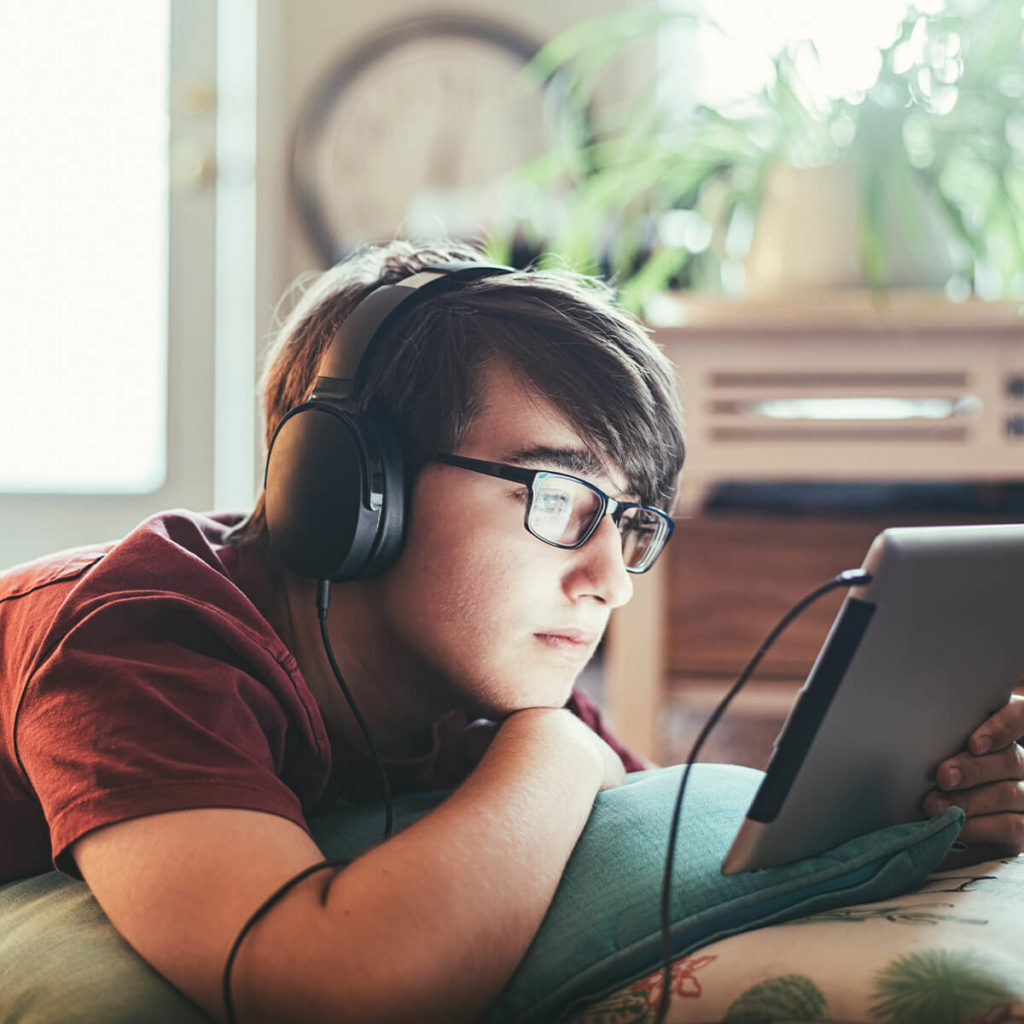 Boy on iPad reading EGF website