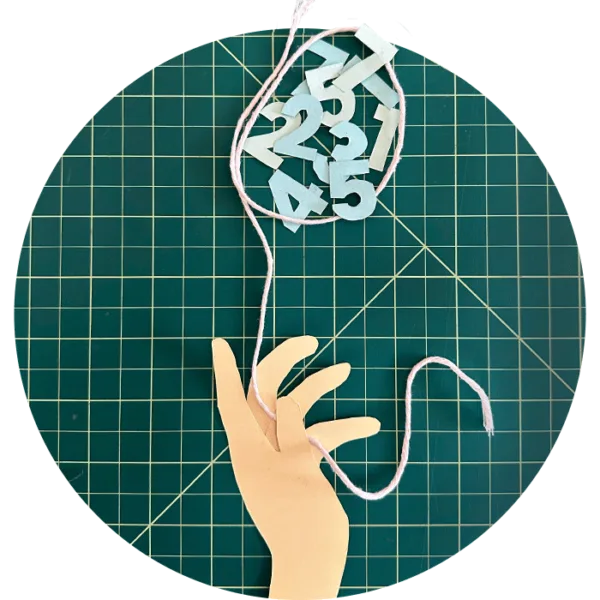 Paper art of hand catching numbers using string lasso