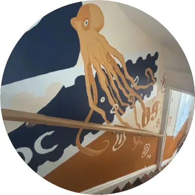 Wall mural in openbox9 office featuring an octopus.